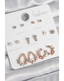 Pirinç Gold Renk Zirkon Taşlı Damla Model Yıldız Detaylı 7 Çift Kadın Küpe Seti