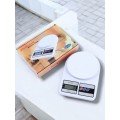 Easy-to-Use Kitchen Scale with Compact Design and One-Button Reset Feature Easy-to-Use Kitchen Scale with Compact Design and One-Button Reset Feature
