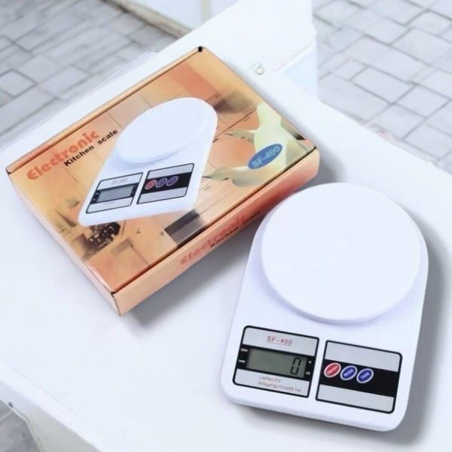 Easy-to-Use Kitchen Scale with Compact Design and One-Button Reset Feature Easy-to-Use Kitchen Scale with Compact Design and One-Button Reset Feature
