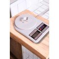 Easy-to-Use Kitchen Scale with Compact Design and One-Button Reset Feature Easy-to-Use Kitchen Scale with Compact Design and One-Button Reset Feature