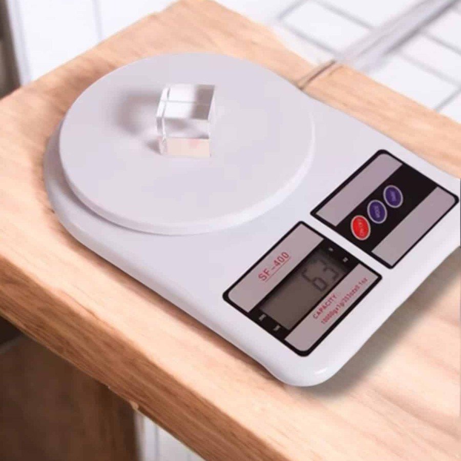 Easy-to-Use Kitchen Scale with Compact Design and One-Button Reset Feature Easy-to-Use Kitchen Scale with Compact Design and One-Button Reset Feature